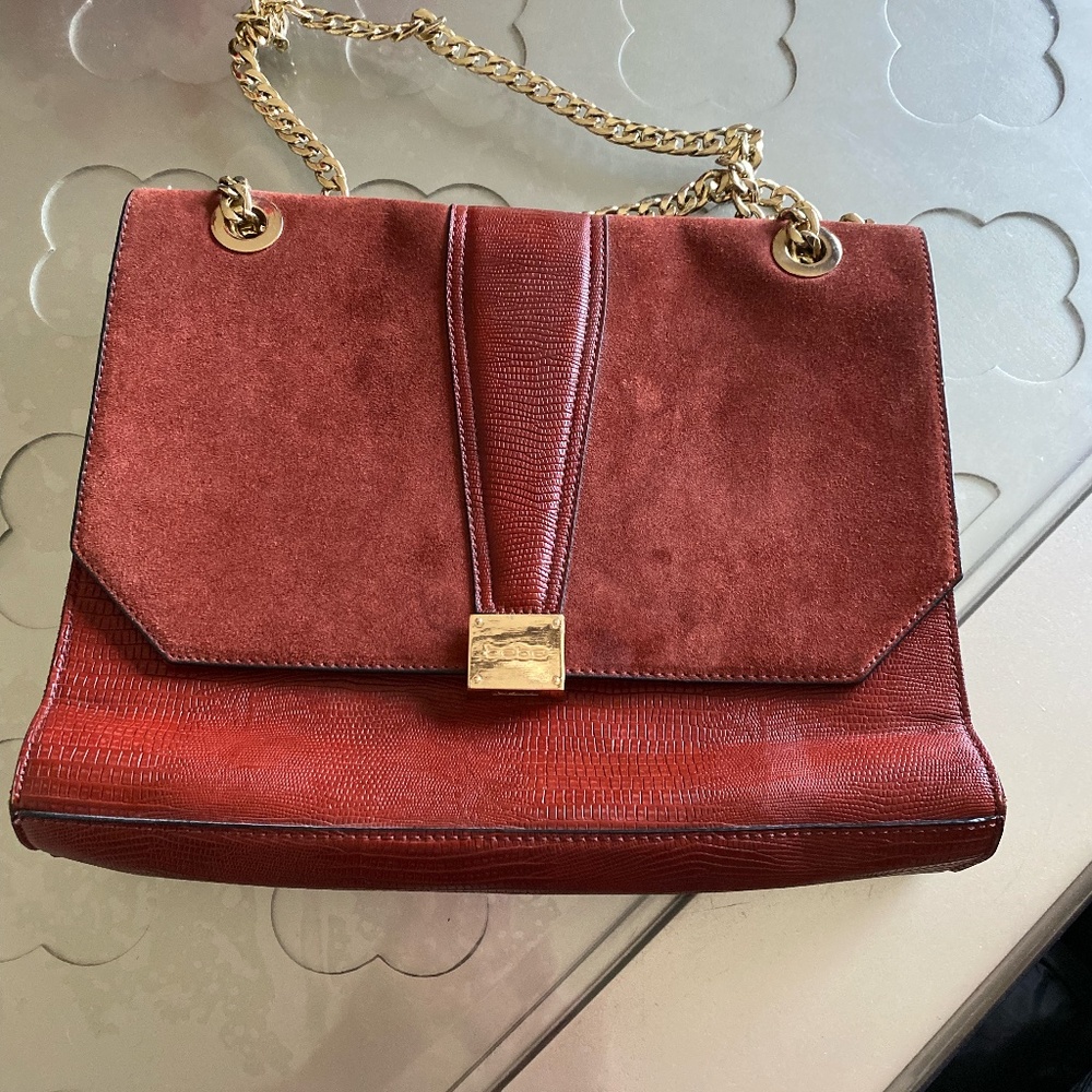 Bebe burgundy handbag